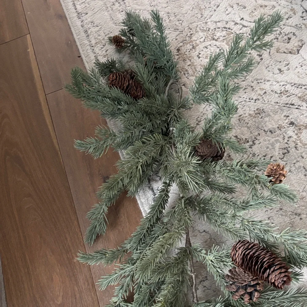 Festive Green Pine Garland with Pinecones 5ft 5ft but with stem it’s closer to 6